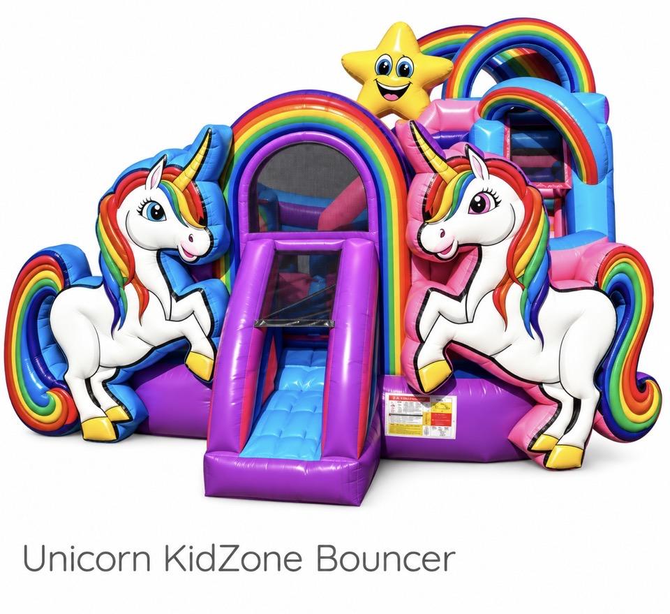 Unicorn themed bounce house with slide